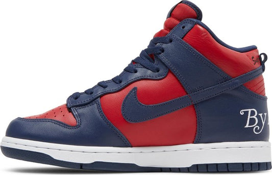 NIKE - Nike SB Dunk High By Any Means - Red Navy x Supreme Sneakers